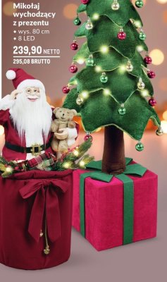 Mikołaj wychodzący z prezentu promocja w Makro