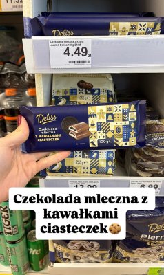Czekolada mleczna z kawałkami ciasteczek  promocja w Dino