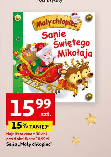 Mały chłopiec - sanie świętego mikołaja promocja w Auchan