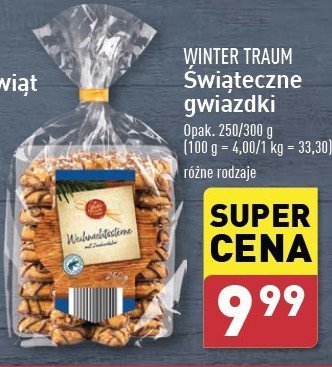 Ciastka gwiazdki z czekoladą mleczną i posypką Wintertraum promocja