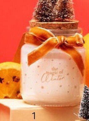 Świeczka The Magic of Winter korzenne pierniczki Eloy promocja w Rossmann